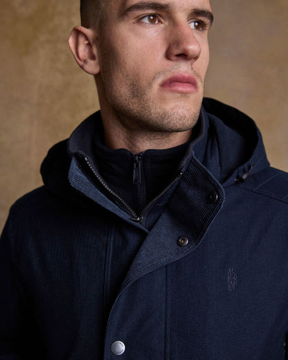 Navy Coloured Jack Murphy Mens Michael Waterproof Jacket on indoor background 