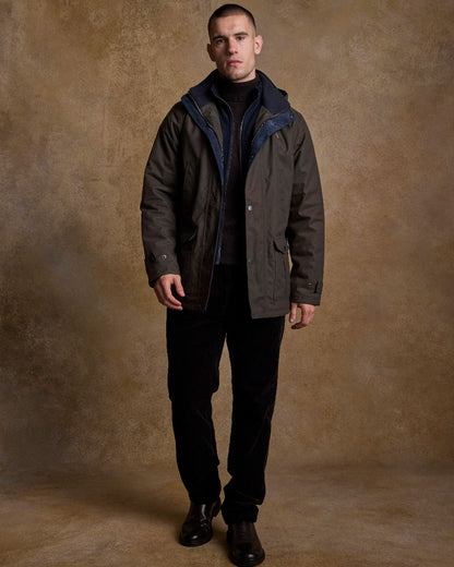Olive Coloured Jack Murphy Mens Michael Waterproof Jacket on indoor background 