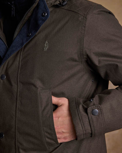 Olive Coloured Jack Murphy Mens Michael Waterproof Jacket on indoor background 
