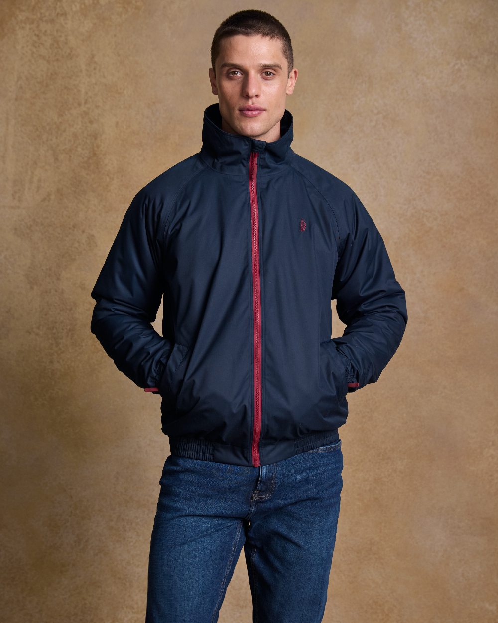 Heritage Navy Coloured Jack Murphy Mens Rockall Waterproof Jacket on indoor background 