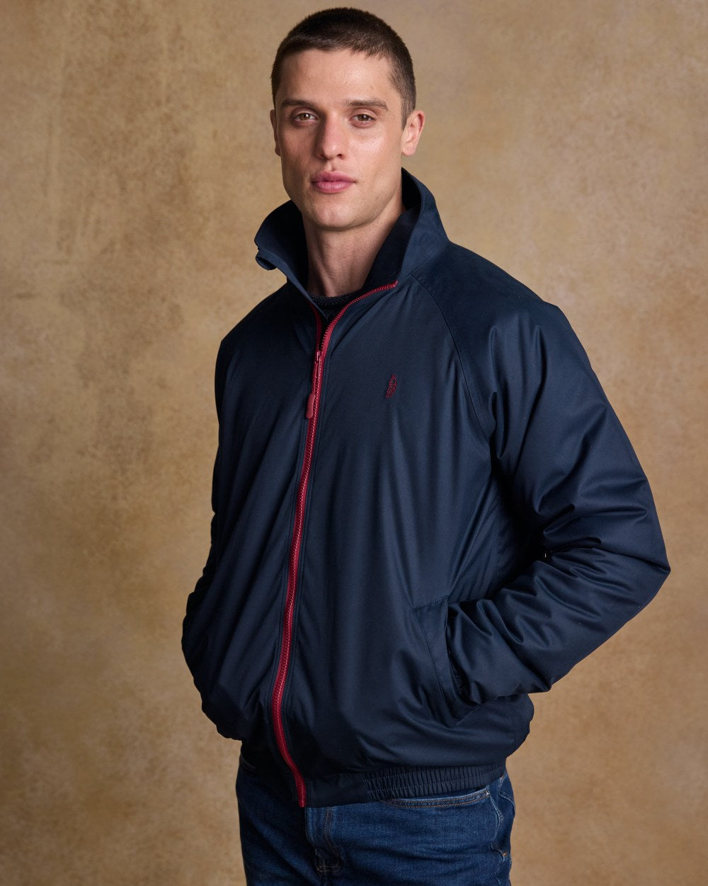 Heritage Navy Coloured Jack Murphy Mens Rockall Waterproof Jacket on indoor background 