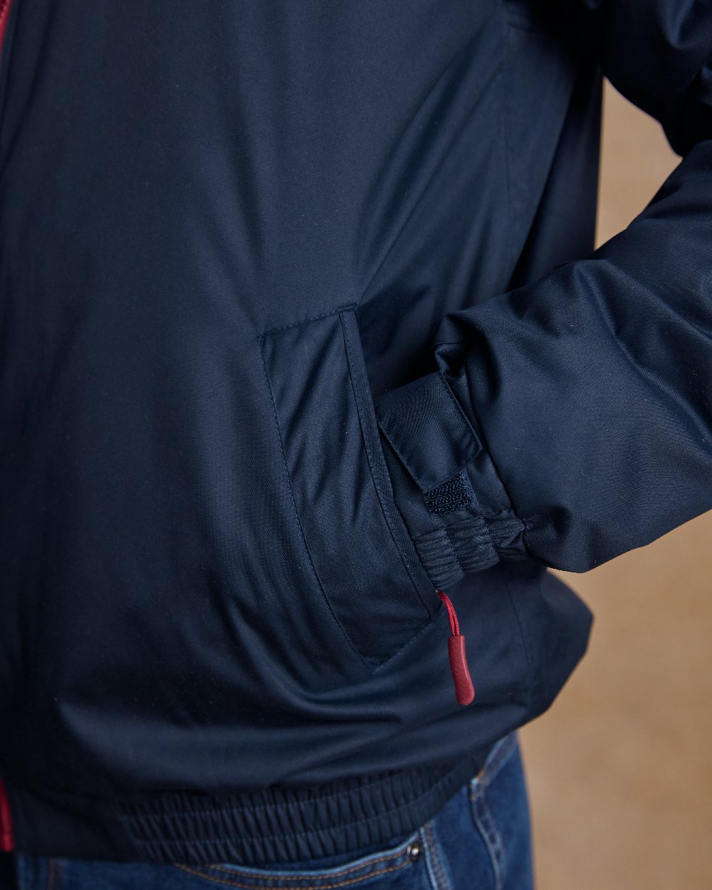 Heritage Navy Coloured Jack Murphy Mens Rockall Waterproof Jacket on indoor background 