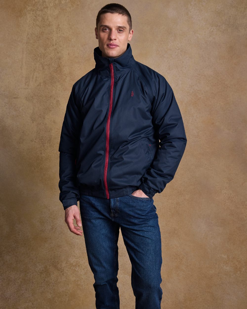Heritage Navy Coloured Jack Murphy Mens Rockall Waterproof Jacket on indoor background 