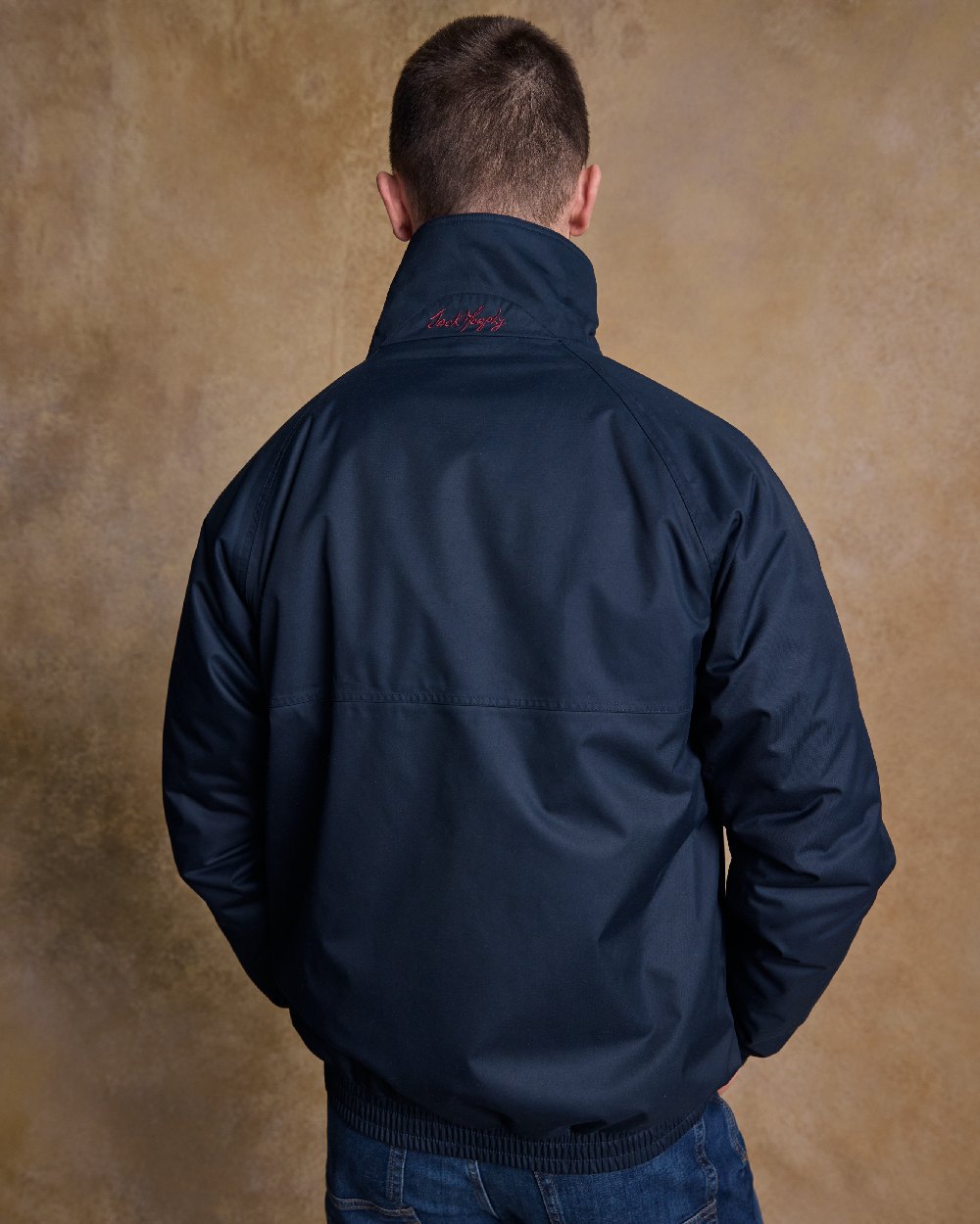 Heritage Navy Coloured Jack Murphy Mens Rockall Waterproof Jacket on indoor background 