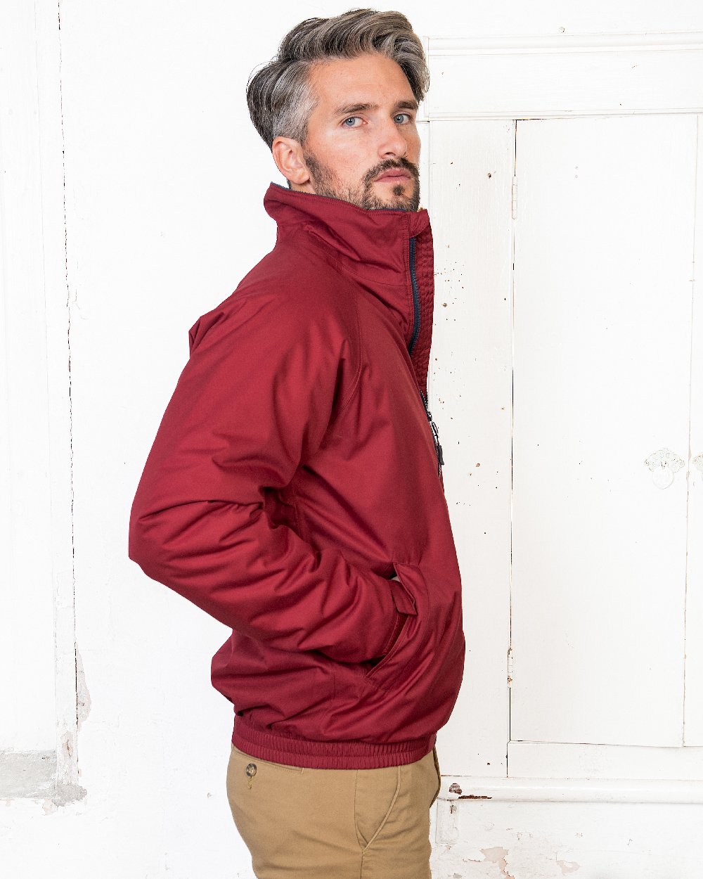 Red Coloured Jack Murphy Mens Rockall Waterproof Jacket on indoor background 