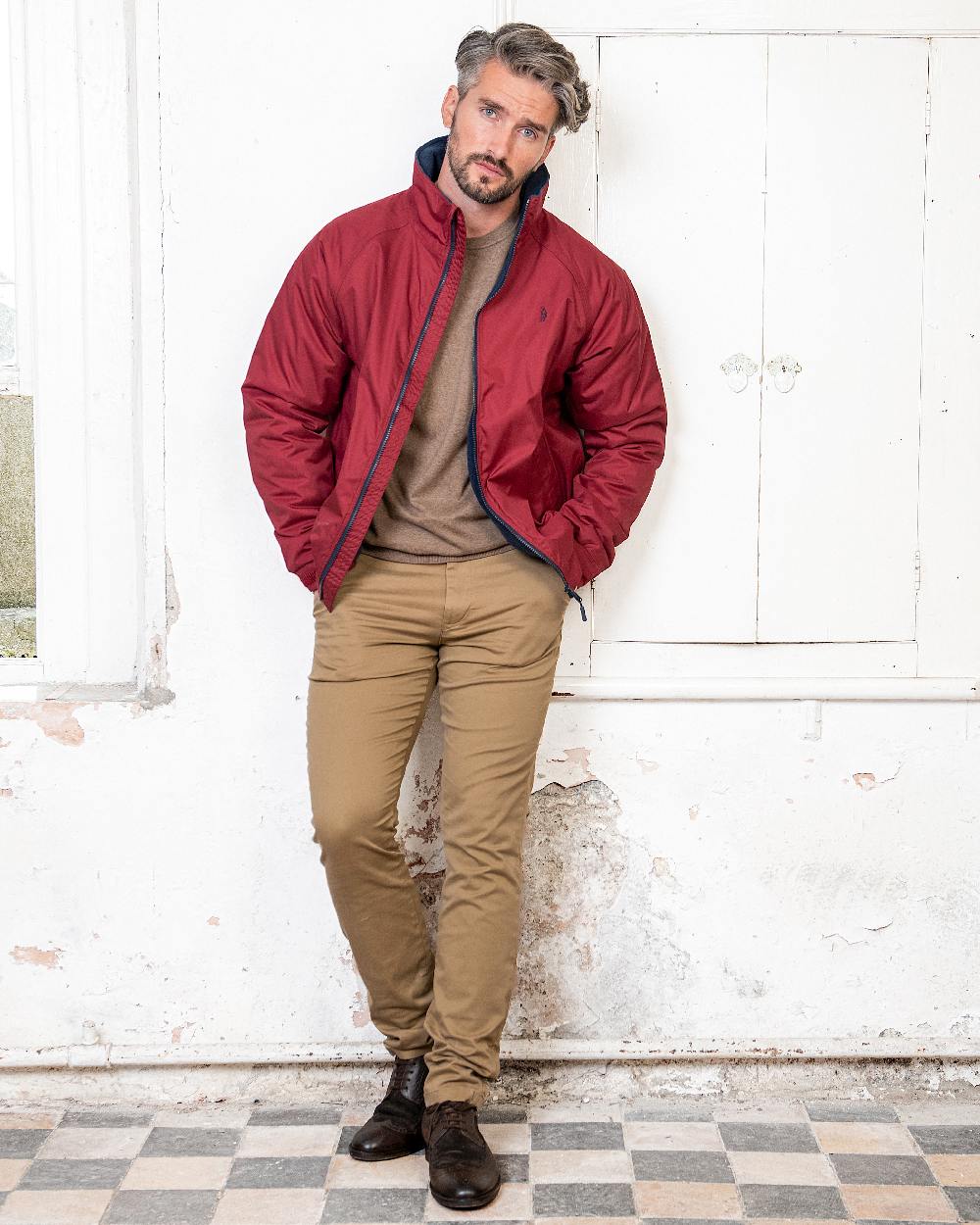 Red Coloured Jack Murphy Mens Rockall Waterproof Jacket on indoor background 