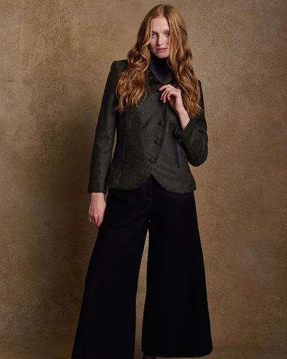 Deep Green Herringbone Coloured Jack Murphy Nicole Ladies Tweed Jacket on indoor background 