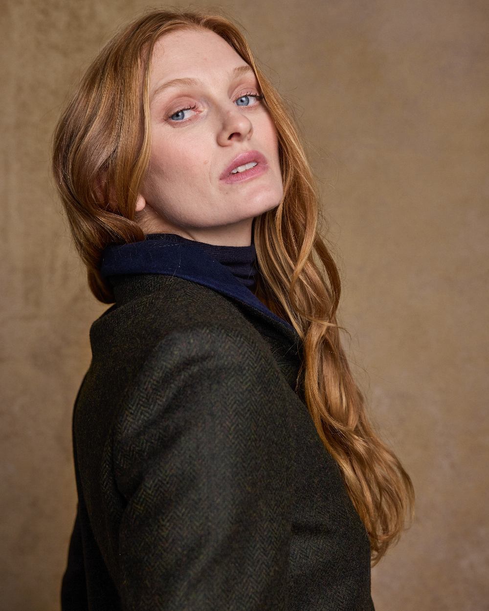 Deep Green Herringbone Coloured Jack Murphy Nicole Ladies Tweed Jacket on indoor background 