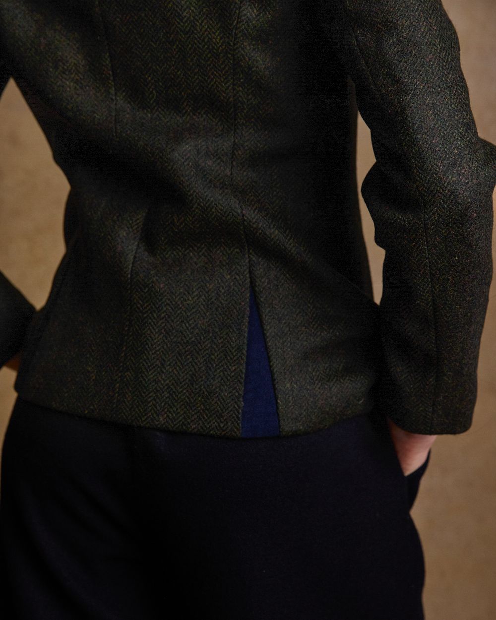 Deep Green Herringbone Coloured Jack Murphy Nicole Ladies Tweed Jacket on indoor background 