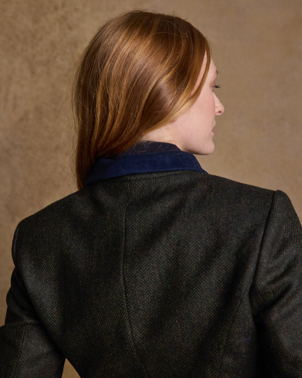 Deep Green Herringbone Coloured Jack Murphy Nicole Ladies Tweed Jacket on indoor background 
