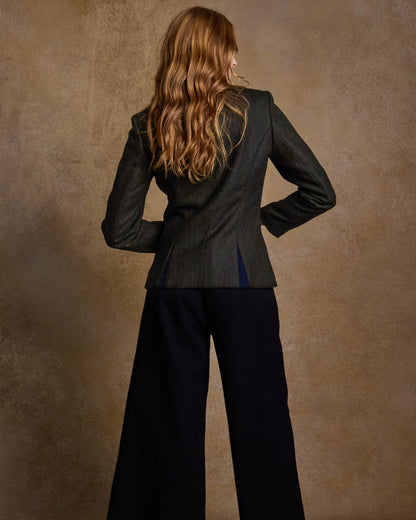 Deep Green Herringbone Coloured Jack Murphy Nicole Ladies Tweed Jacket on indoor background 