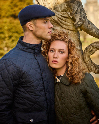 Navy coloured Jack Murphy Ronan Quilted Jacket on outdoor background 