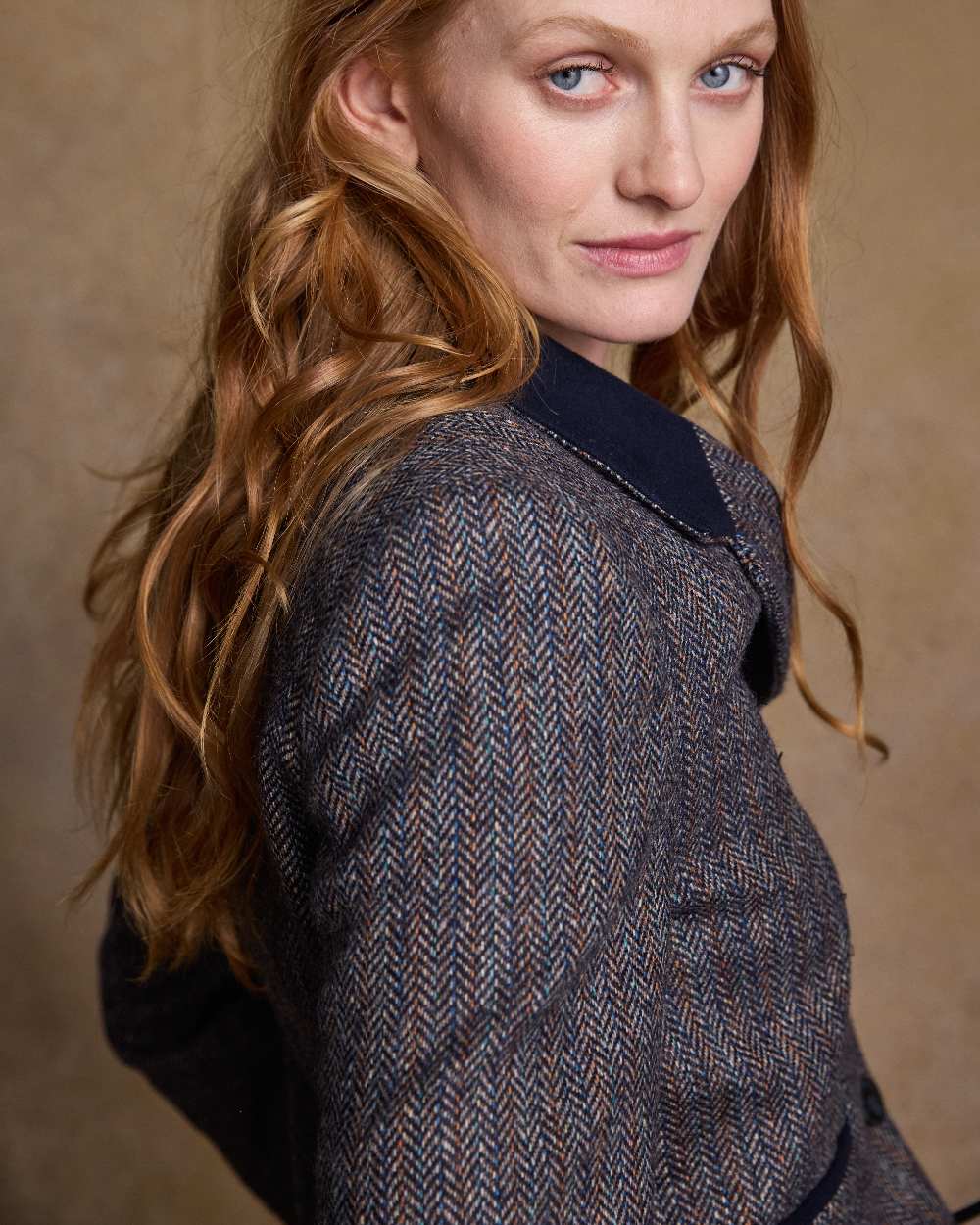 Blue Moon Herringbone Coloured Jack Murphy Sasha Tweed Jacket on indoor background 