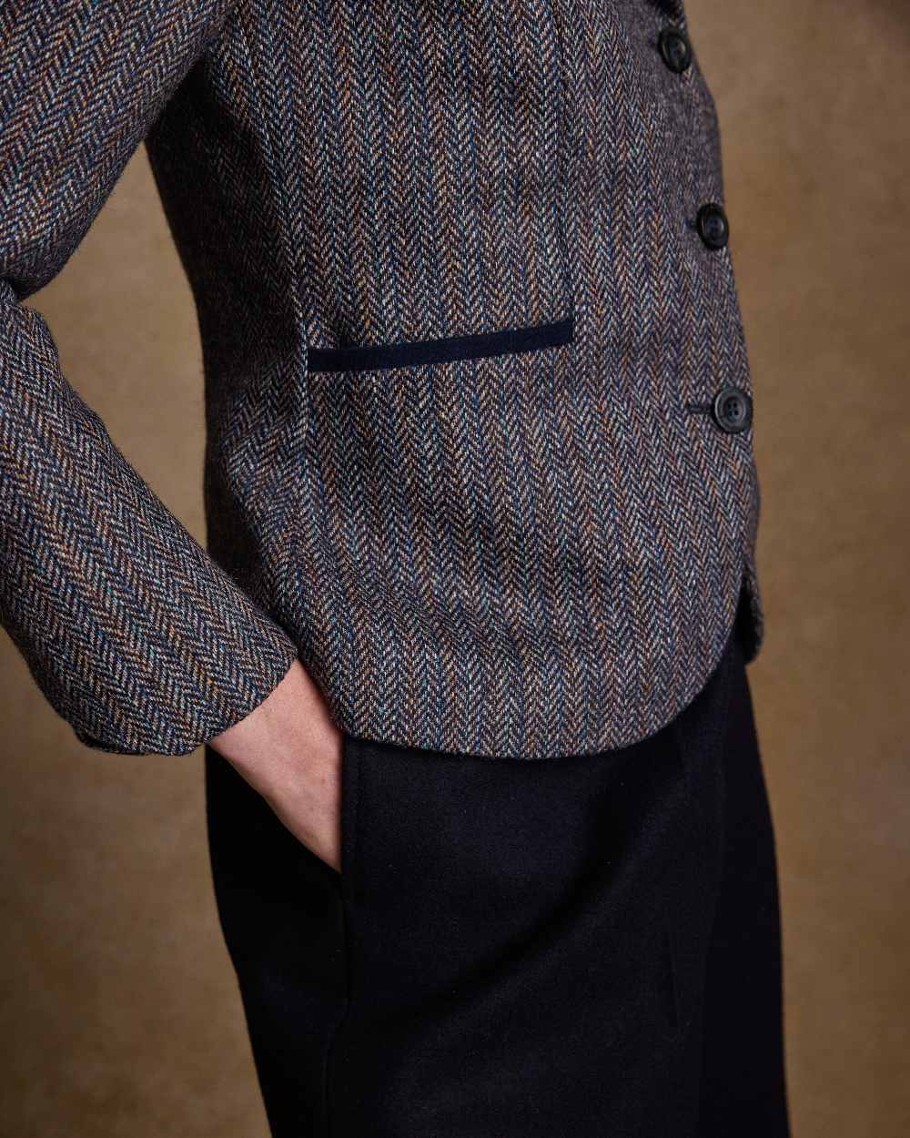 Blue Moon Herringbone Coloured Jack Murphy Sasha Tweed Jacket on indoor background 