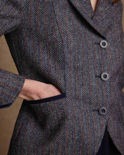 Blue Moon Herringbone Coloured Jack Murphy Sasha Tweed Jacket on indoor background 