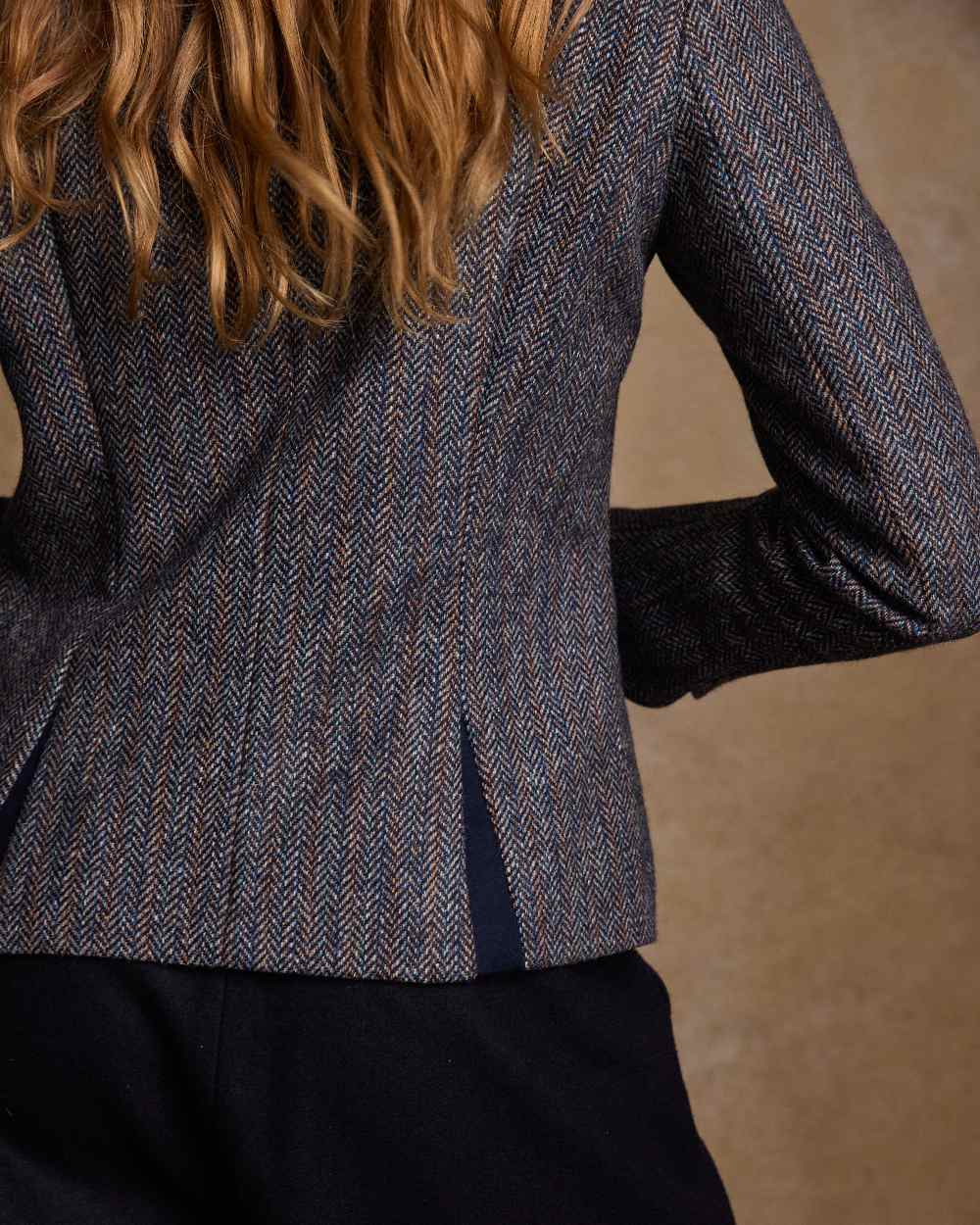 Blue Moon Herringbone Coloured Jack Murphy Sasha Tweed Jacket on indoor background 