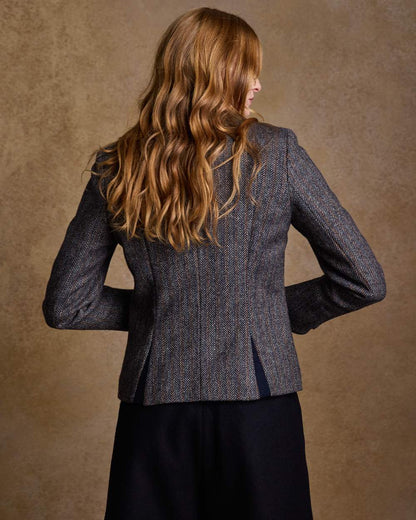 Blue Moon Herringbone Coloured Jack Murphy Sasha Tweed Jacket on indoor background 