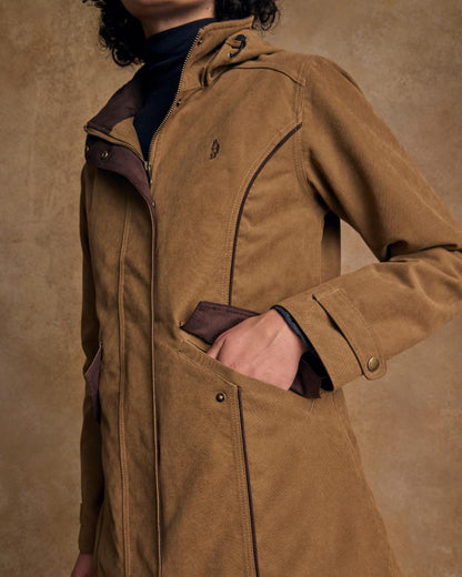 Camel Coloured Jack Murphy Una 3/4 Waterproof Coat on indoor background 