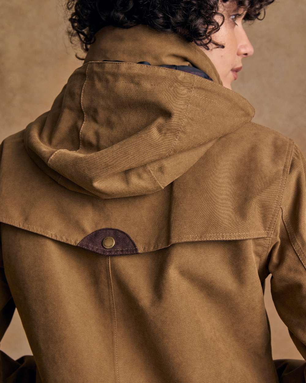 Camel Coloured Jack Murphy Una 3/4 Waterproof Coat on indoor background 