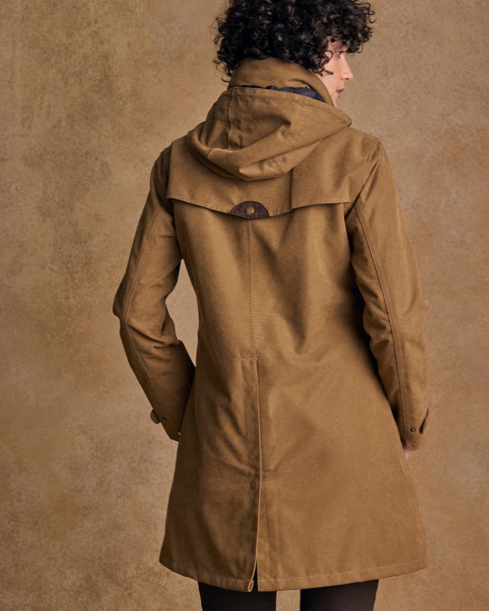 Camel Coloured Jack Murphy Una 3/4 Waterproof Coat on indoor background 
