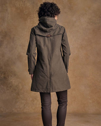 Olive coloured Jack Murphy Una 3/4 Waterproof Coat on wall background 