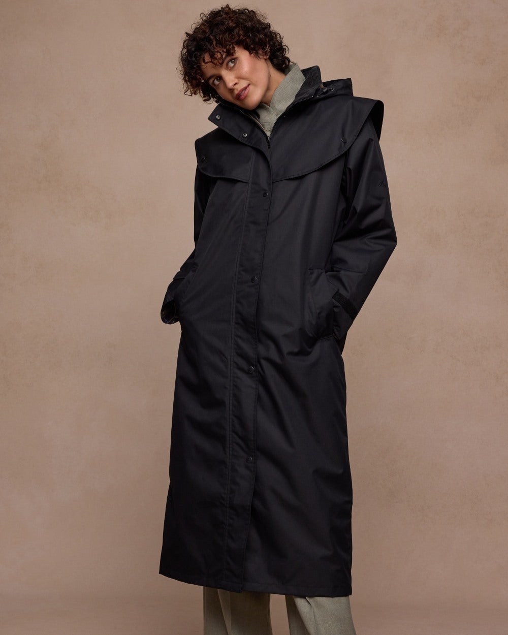 Black Coloured Jack Murphy Womens Connemara Waterproof Coat on indoor background 