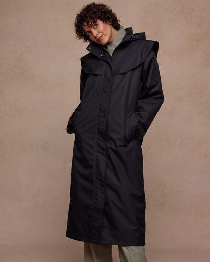 Black Coloured Jack Murphy Womens Connemara Waterproof Coat on indoor background 