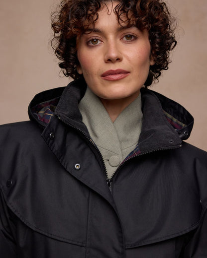 Black Coloured Jack Murphy Womens Connemara Waterproof Coat on indoor background 
