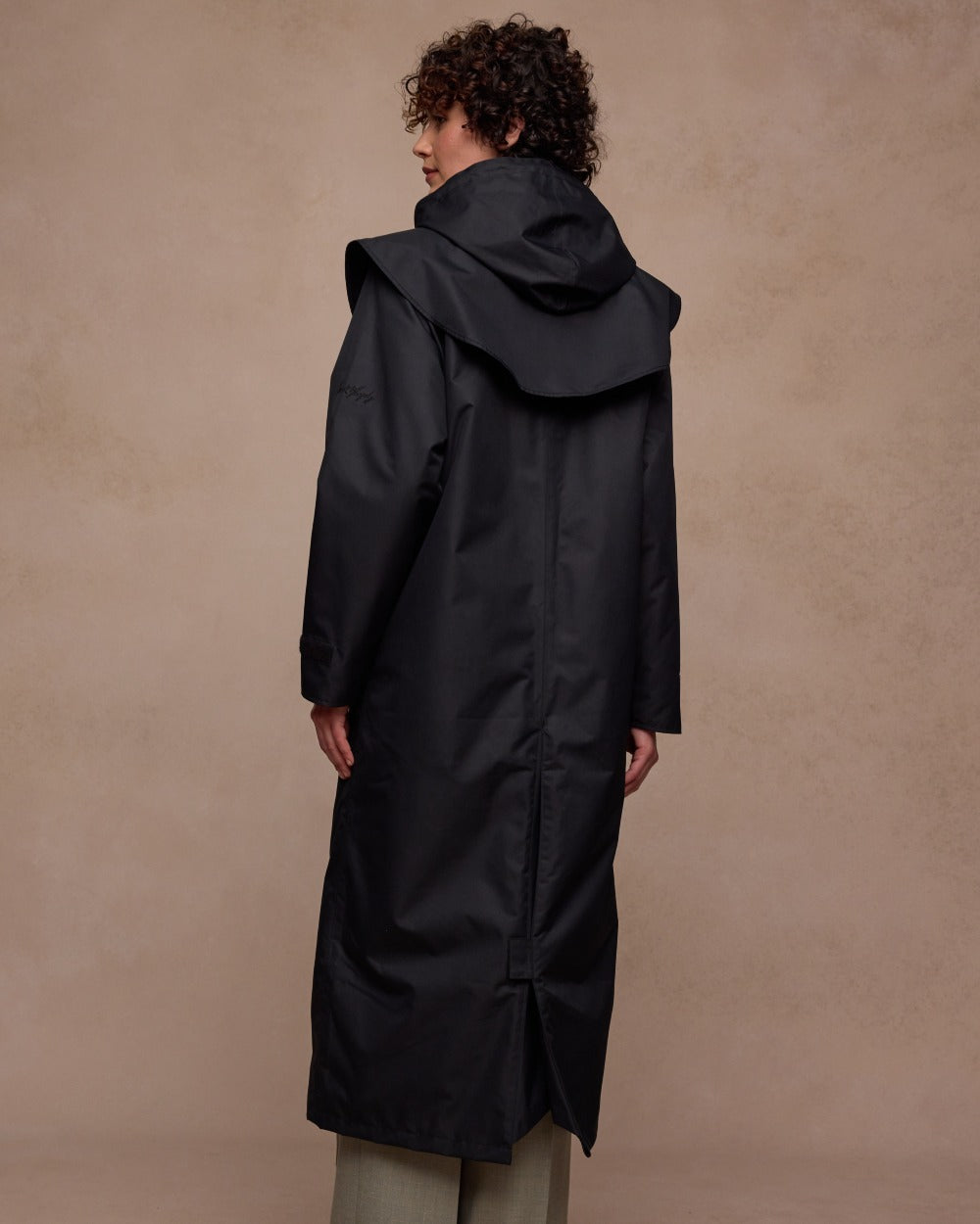 Black Coloured Jack Murphy Womens Connemara Waterproof Coat on indoor background 