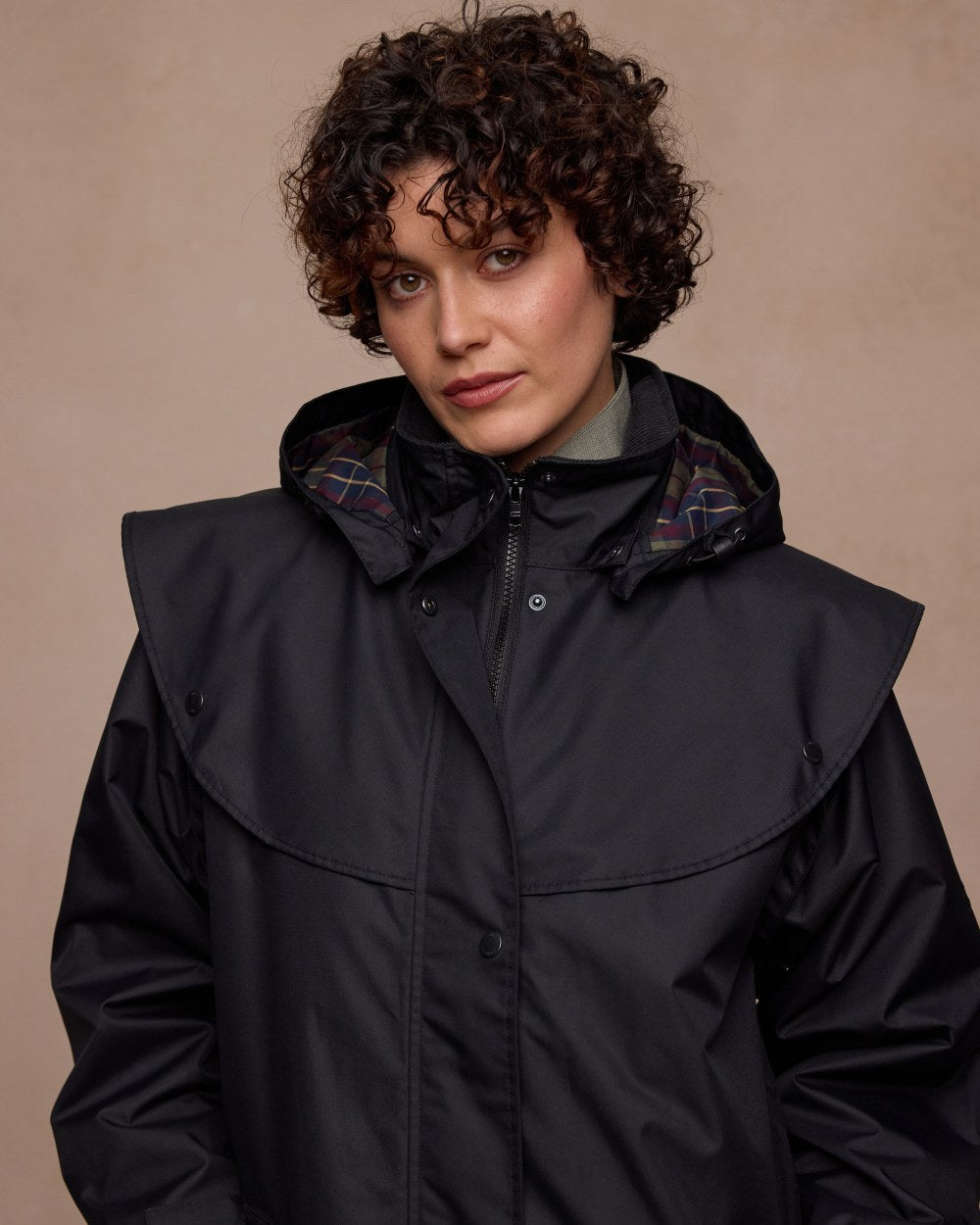 Black Coloured Jack Murphy Womens Connemara Waterproof Coat on indoor background 