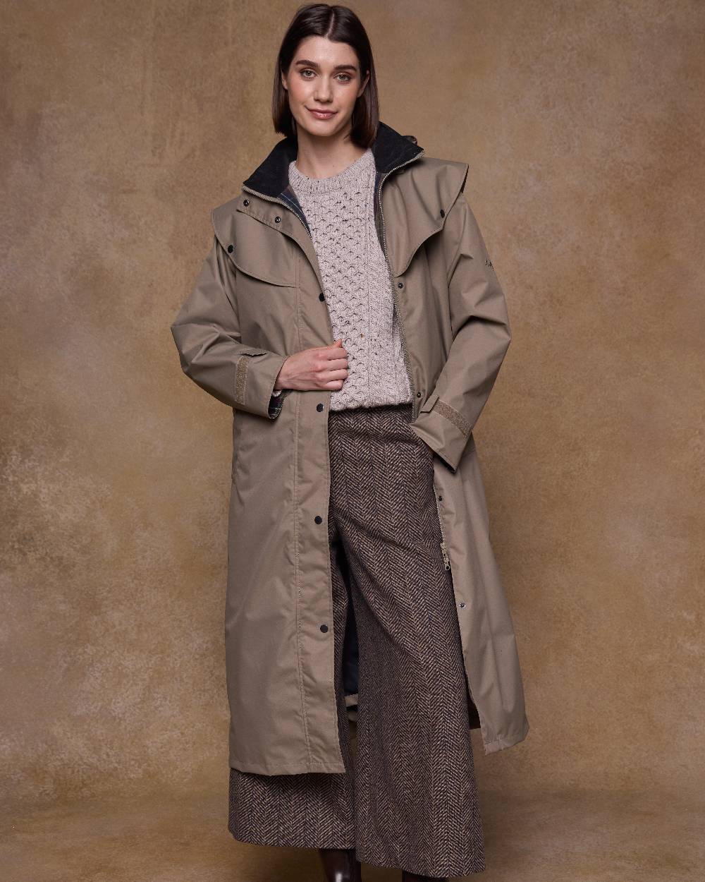 Chinchilla Coloured Jack Murphy Womens Connemara Waterproof Coat on indoor background 