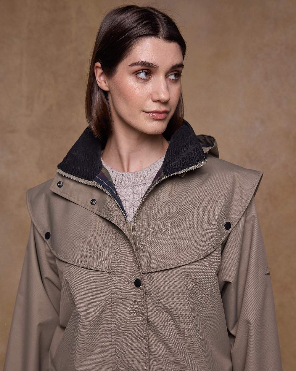 Chinchilla Coloured Jack Murphy Womens Connemara Waterproof Coat on indoor background 