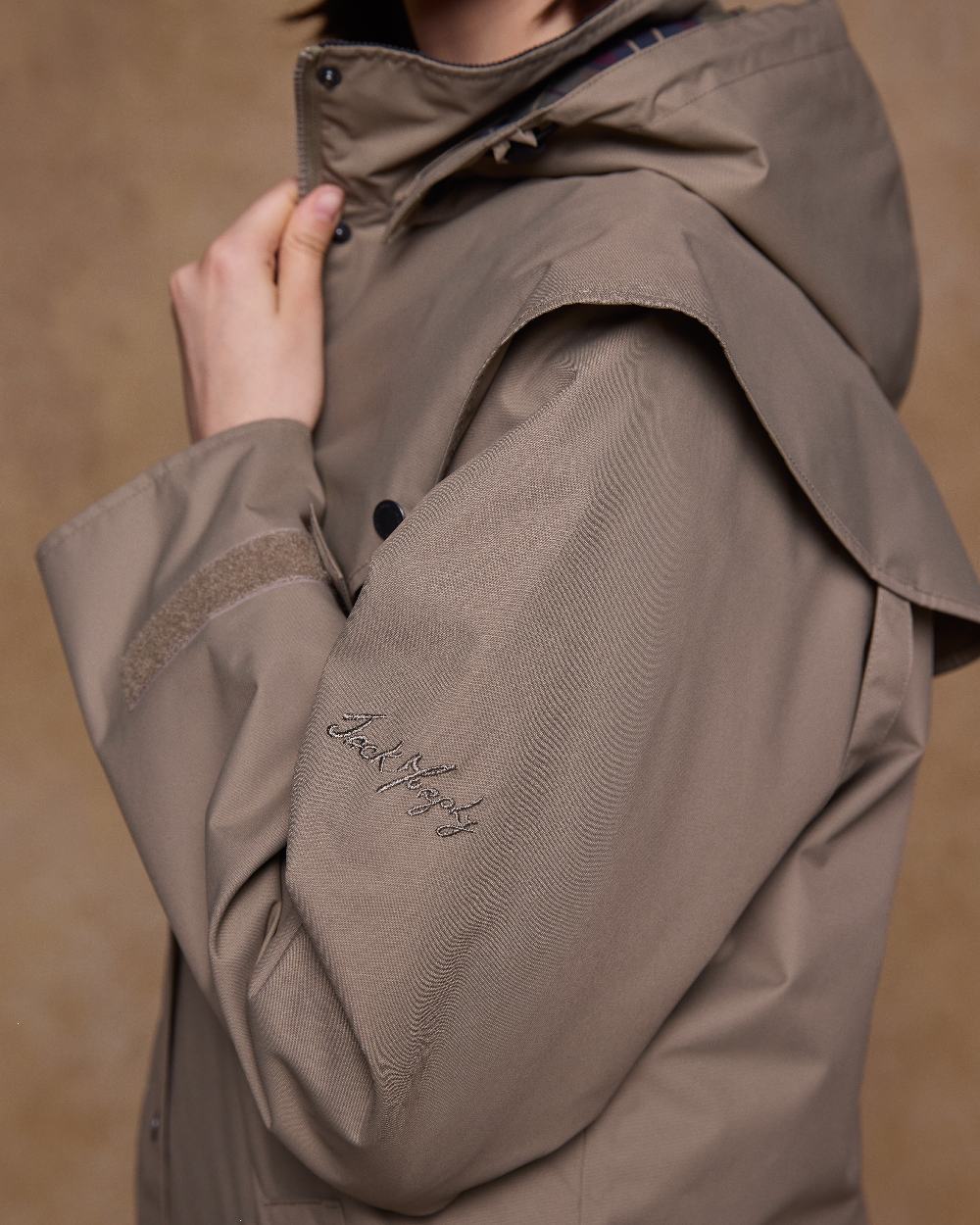 Chinchilla Coloured Jack Murphy Womens Connemara Waterproof Coat on indoor background 