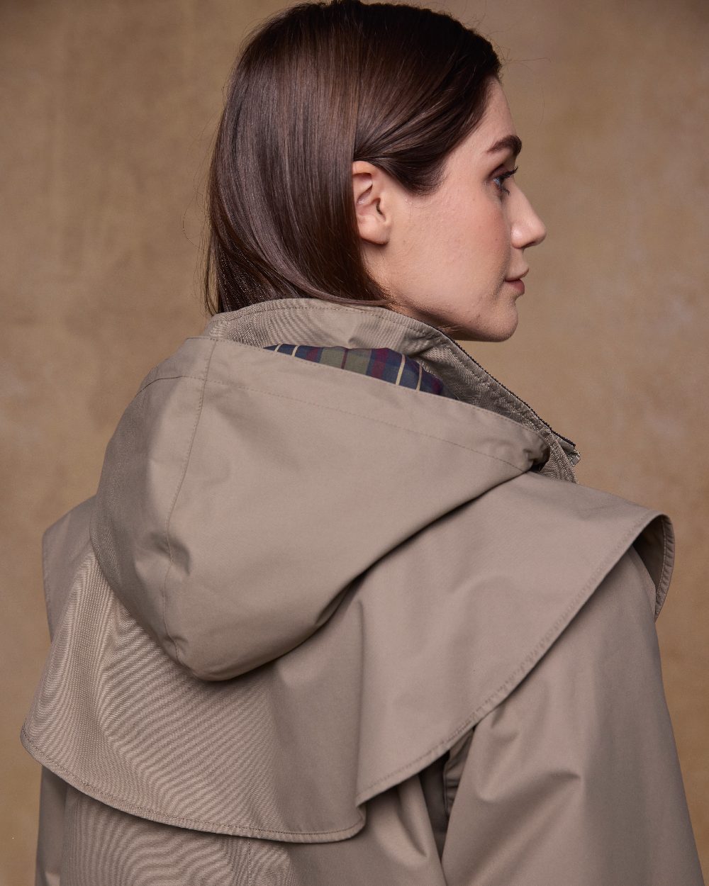 Chinchilla Coloured Jack Murphy Womens Connemara Waterproof Coat on indoor background 