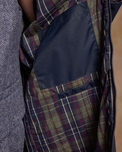 Navy Coloured Jack Murphy Womens Connemara Waterproof Coat on indoor background 