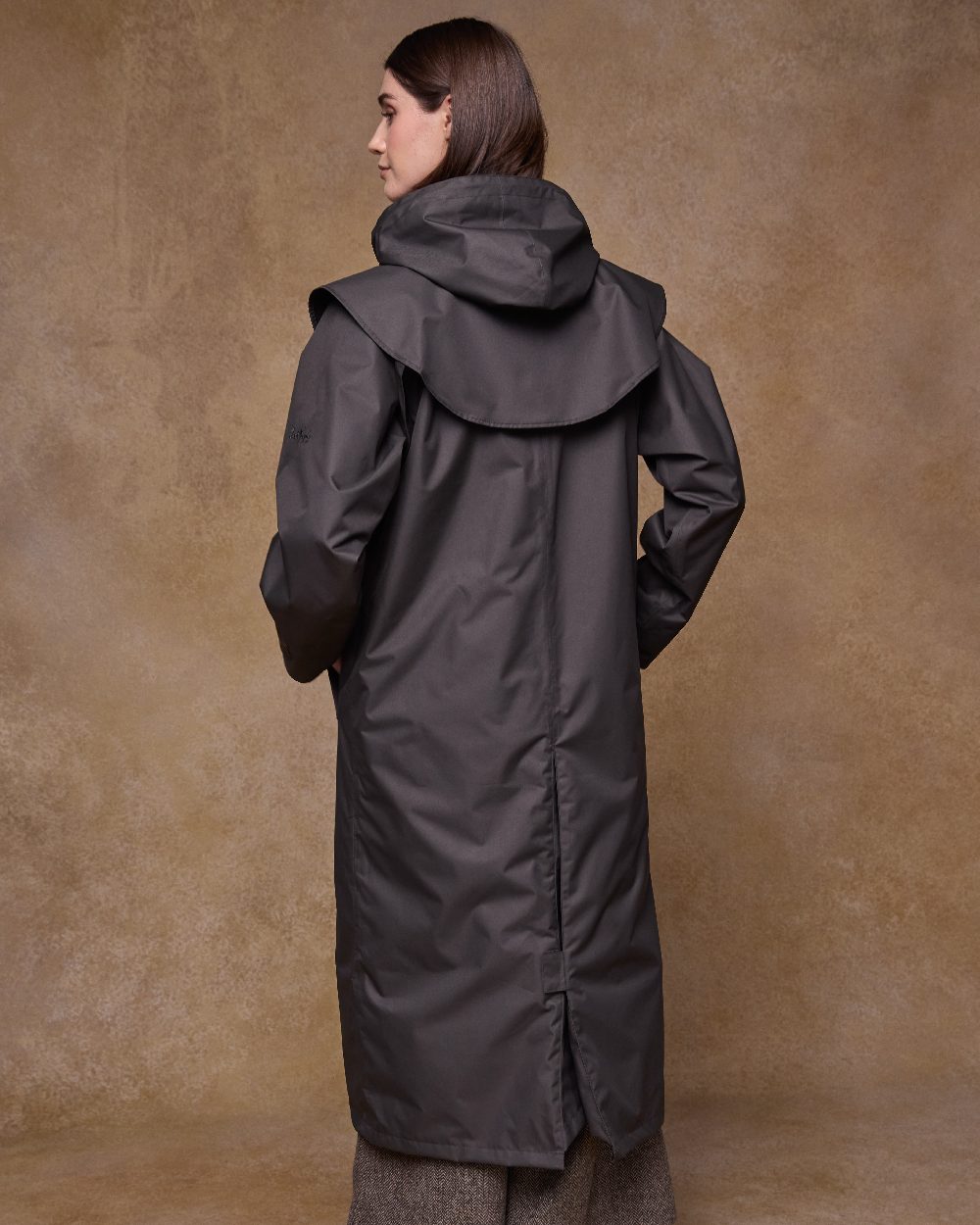 Olive Coloured Jack Murphy Womens Connemara Waterproof Coat on indoor background 