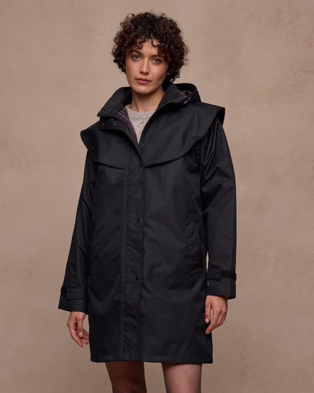 Black Coloured Jack Murphy Womens Dingle Waterproof Jacket on indoor background 