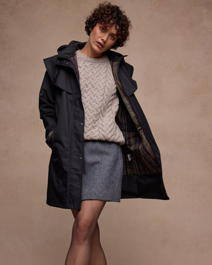 Black Coloured Jack Murphy Womens Dingle Waterproof Jacket on indoor background 