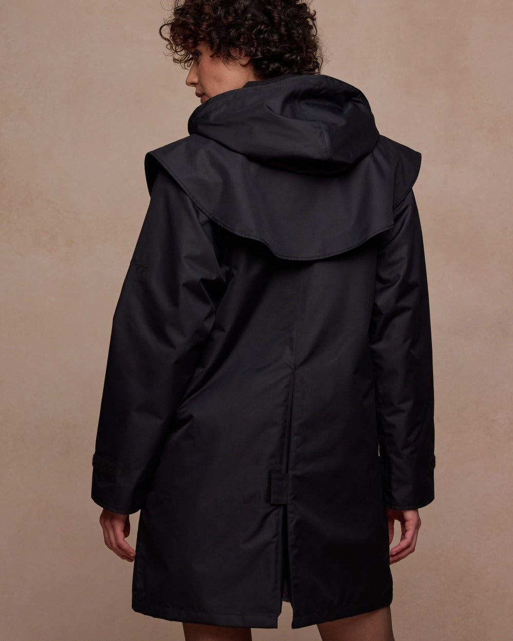 Black Coloured Jack Murphy Womens Dingle Waterproof Jacket on indoor background 
