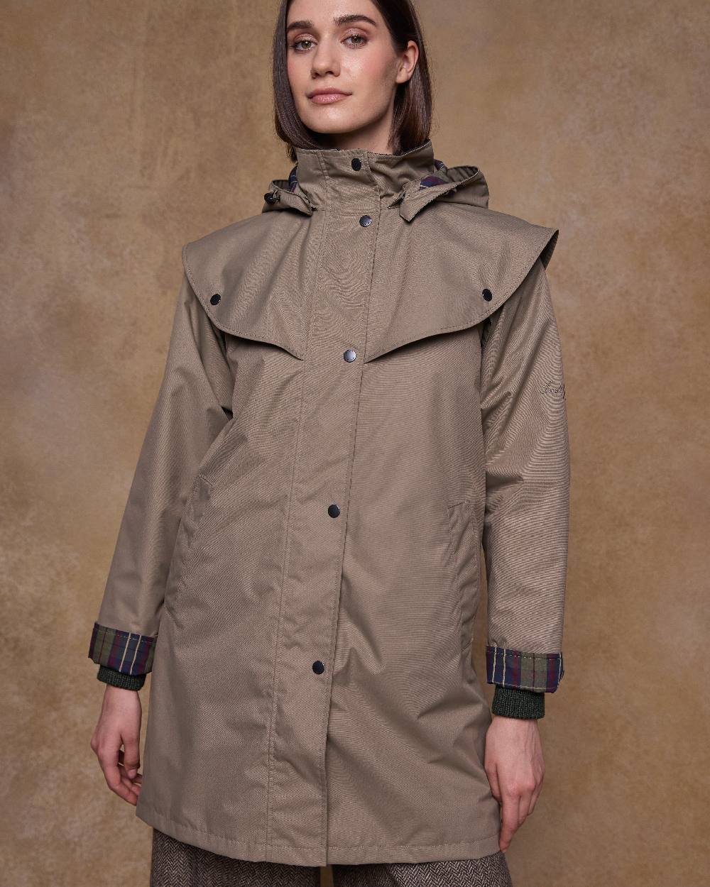 Chinchilla Coloured Jack Murphy Womens Dingle Waterproof Jacket on indoor background 