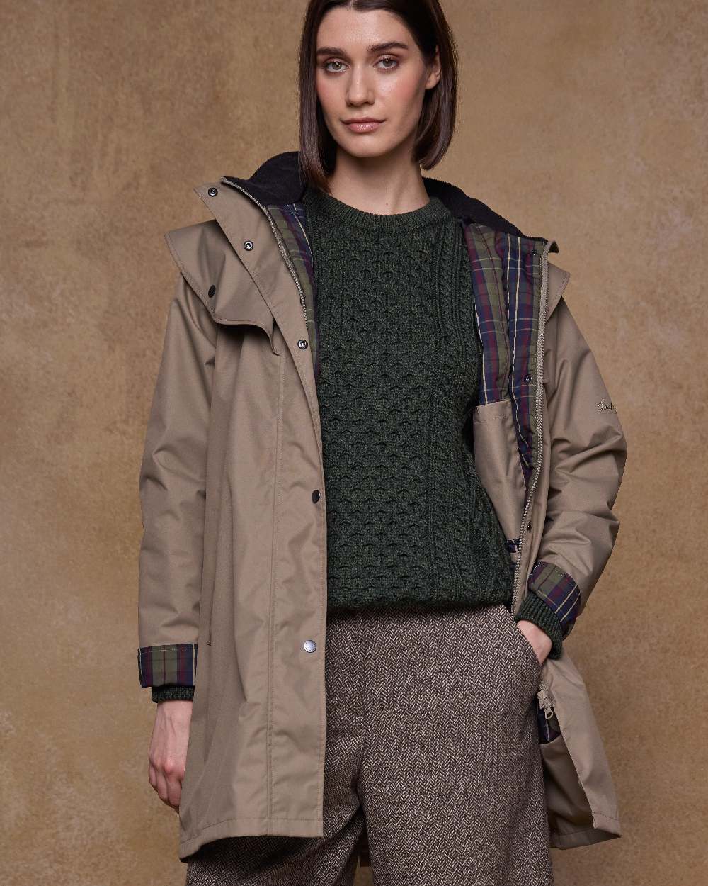 Chinchilla Coloured Jack Murphy Womens Dingle Waterproof Jacket on indoor background 