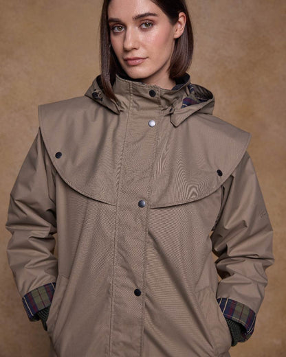 Chinchilla Coloured Jack Murphy Womens Dingle Waterproof Jacket on indoor background 