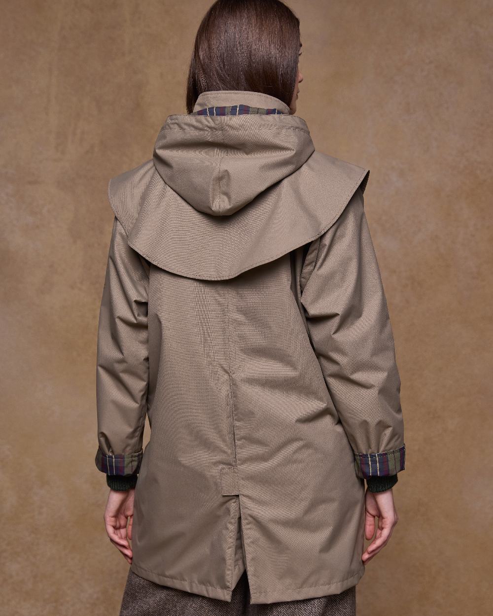 Chinchilla Coloured Jack Murphy Womens Dingle Waterproof Jacket on indoor background 