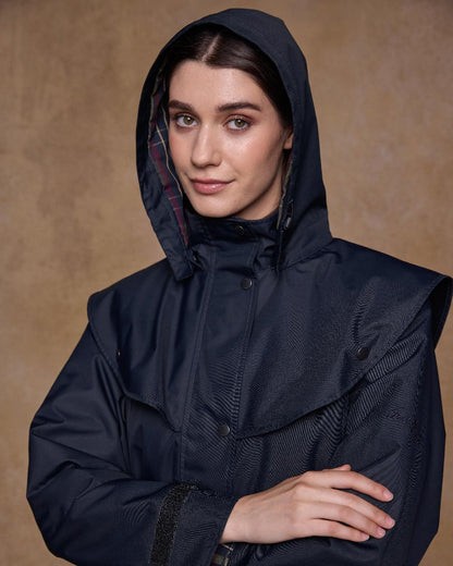 Navy Coloured Jack Murphy Womens Dingle Waterproof Jacket on indoor background 