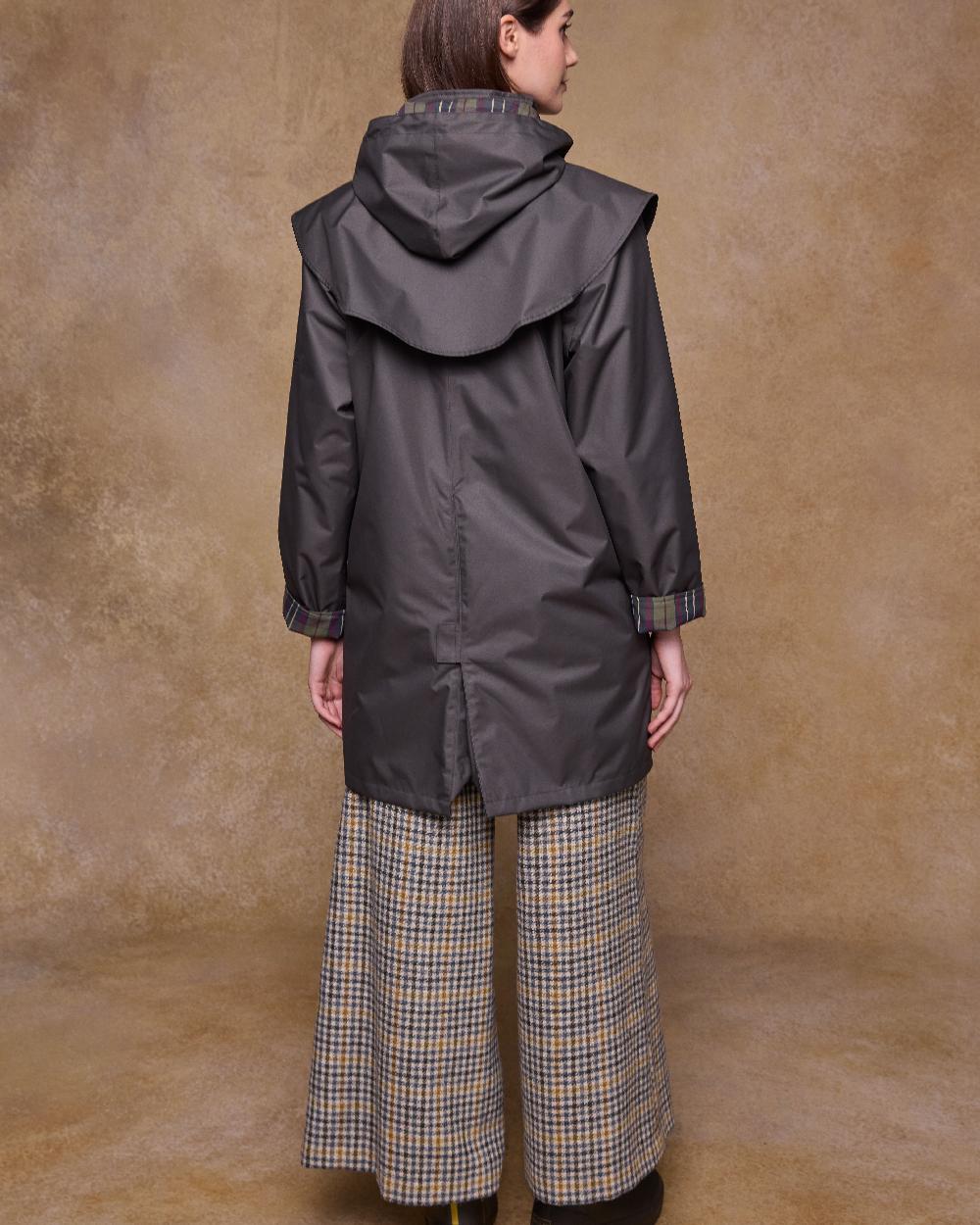 Olive Coloured Jack Murphy Womens Dingle Waterproof Jacket on indoor background 
