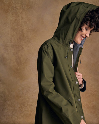 Olive Coloured Jack Murphy Womens Fiadh Waterproof Jacket on indoor background 