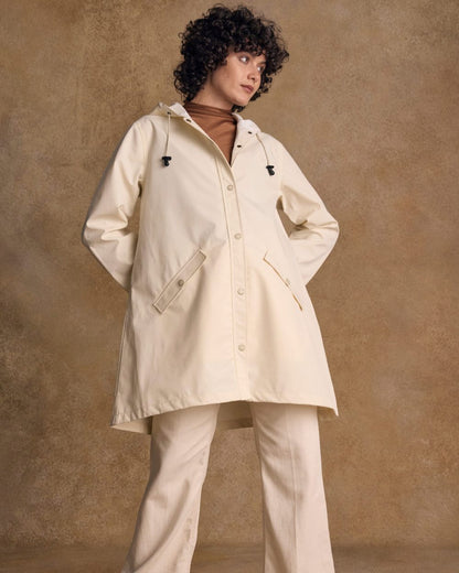 Pearl Coloured Jack Murphy Womens Fiadh Waterproof Jacket on indoor background 