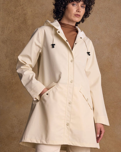 Pearl Coloured Jack Murphy Womens Fiadh Waterproof Jacket on indoor background 