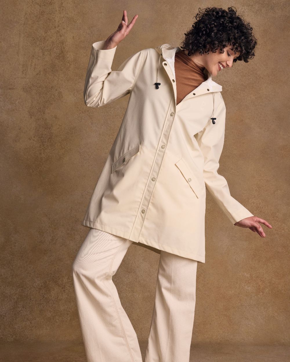 Pearl Coloured Jack Murphy Womens Fiadh Waterproof Jacket on indoor background 