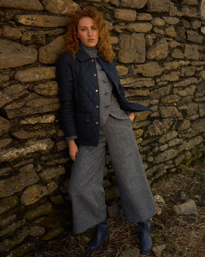 Navy coloured Jack Murphy Womens Molly Quilted Jacket on outdoor background 